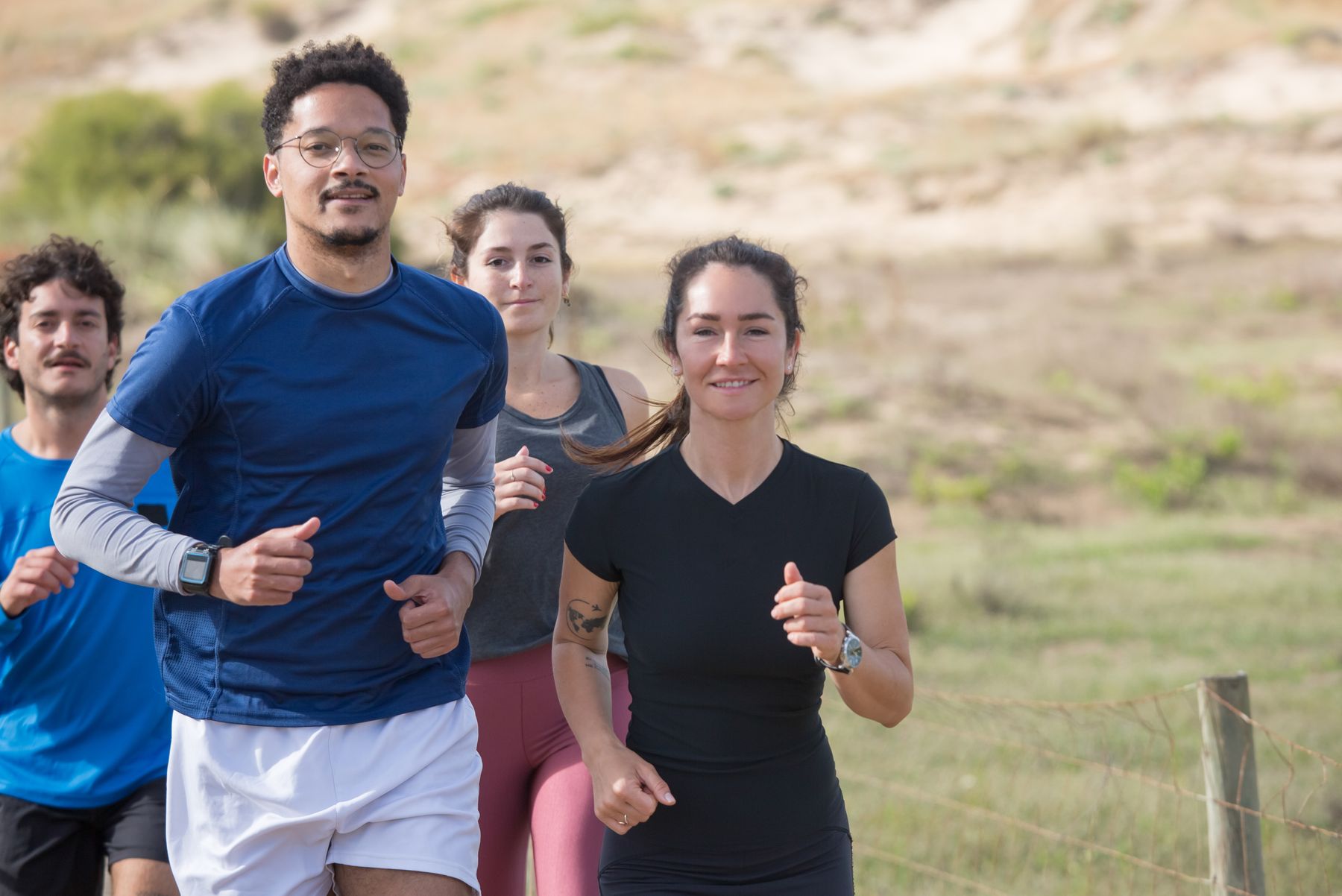 A diverse community takes part in an outdoor running activity